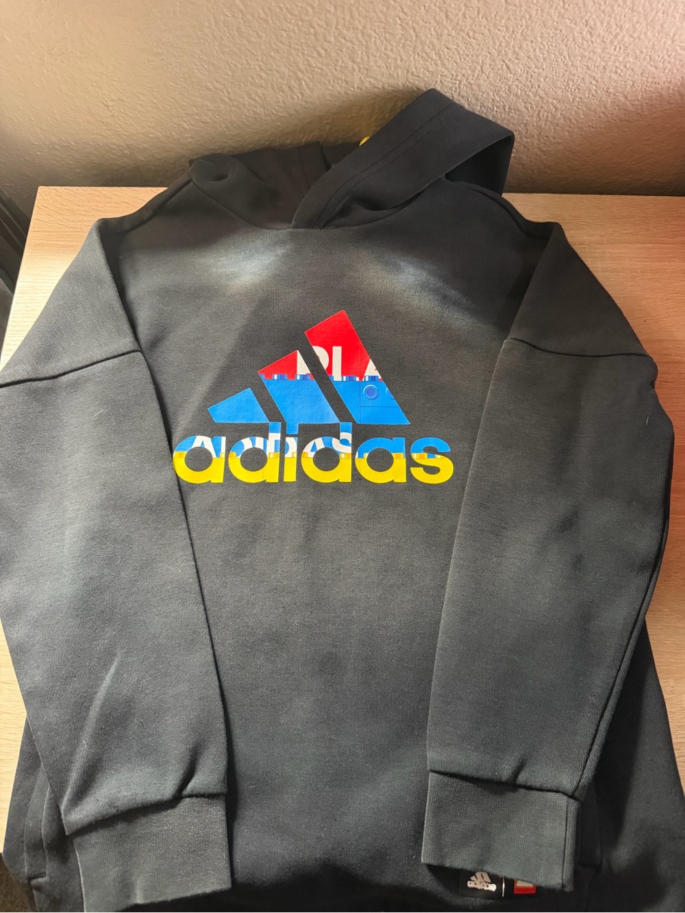 adidas Kids Black Hoodie with Red, Blue & Yellow Logo